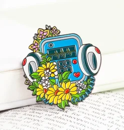 Défibrillateur avec des fleurs - Pins