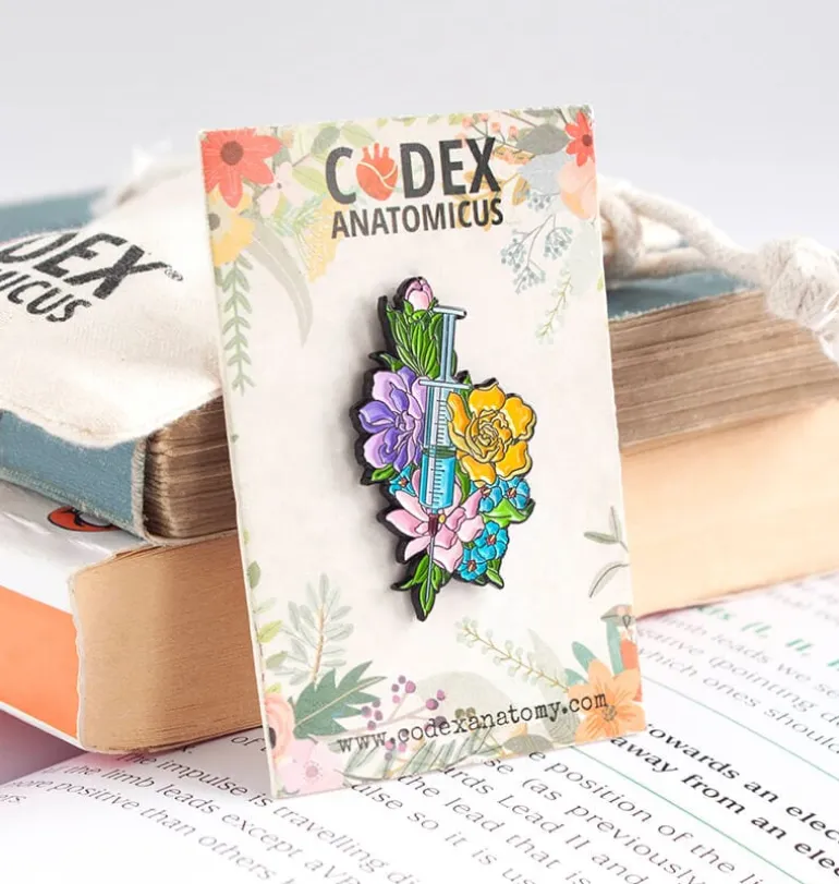 Seringue avec des fleurs - Pins